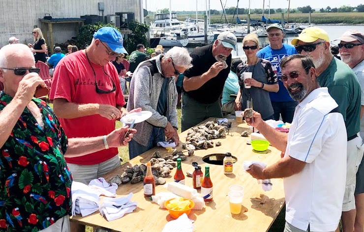 Marina guests enjoying a customer appreciation oyster roast